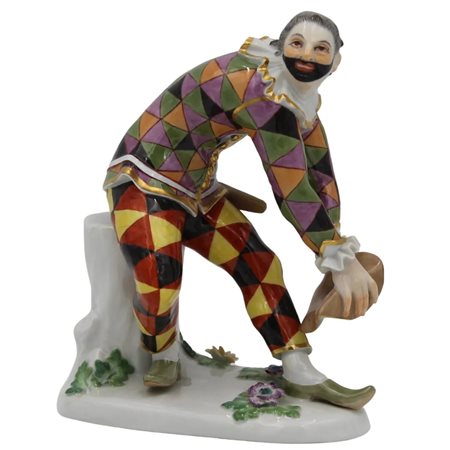 Arlecchino seduto Porcellana policroma. Meissen. Secolo XX. Cm h 16