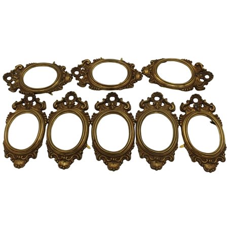 Lotto piccole cornici Bronzo varie forme e dimensioni.