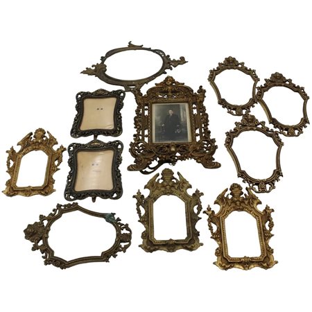 Lotto piccole cornici Bronzo varie forme e dimensioni.
