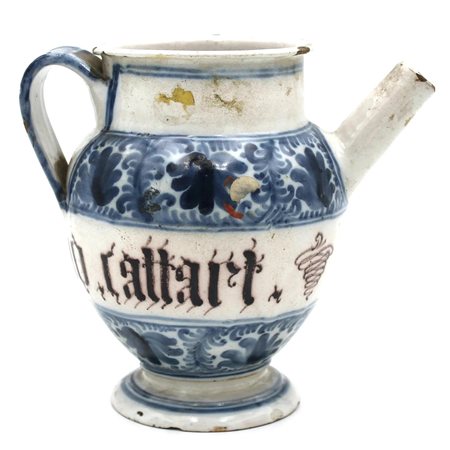 Versatoio Antica maiolica decorata a motivi ornamentali policromi su fondo...