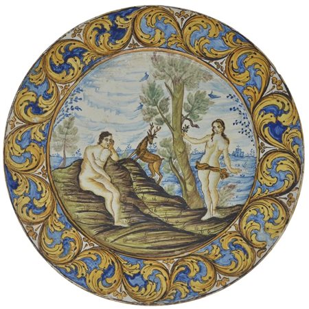 Piatto Maiolica con raffigurazione di Adamo ed Eva e motivi ornamentali...