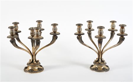  
Coppia di candelabri 
 Cm 30,5x32ø