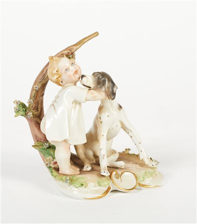  
"Bambina e cagnolino" 
Scultura in ceramica Cm 11x9