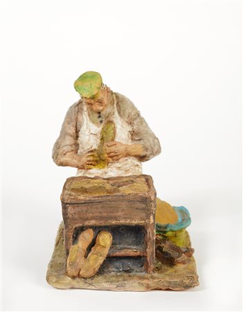 Cleto Tomba (Castel San Pietro Terme, 19/08/1898 - Bologna, 29/11/1987) "Calzolaio" Scultura in terracotta policroma Cm 15,5x13x11,5