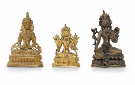 TRE FIGURE DI DIVINITA' ORIENTALI IN METALLO DORAT