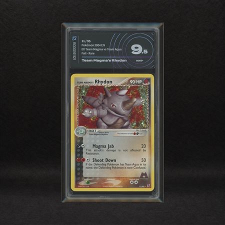 The Pokémon Company  
Team Magma's Rhydon #11 Holo, EX Team Magma vs Team Aqua [ENG] 2004
 
