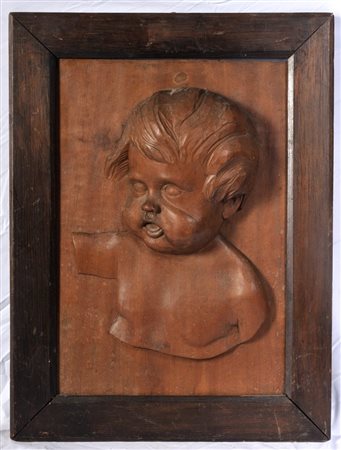  
Busto di fanciullo in altorilievo in legno prima metà XX secolo
 44 x 30 x 12 cm