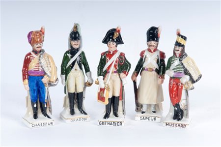  
Lotto di cinque porcellane policrome metà XX secolo
 12,5 x 3 x 3,5 cm; 12 x 3,5 x 3 cm