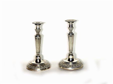 Coppia di candelabri in argento Toscana, metà del XIX secolo fusti scanalati...