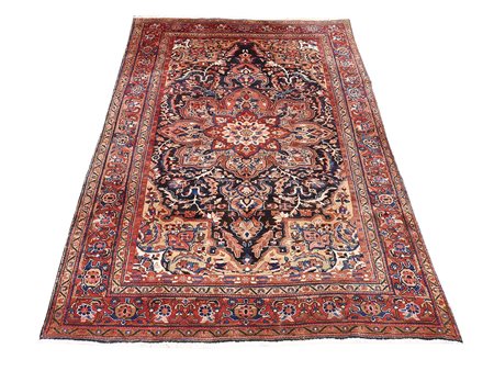 Tappeto persiano Heriz fondo rosso, campo con medaglione centrale e motivi...