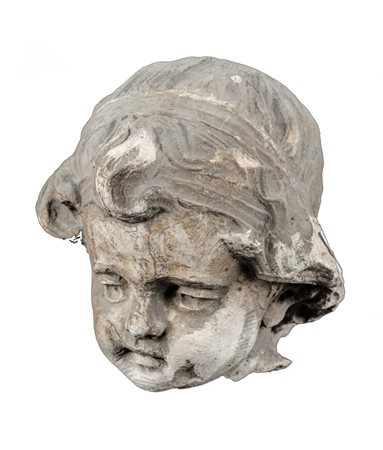 SCULTURA in pietra raffigurante "testa di puttino". Sicilia XIX secolo...