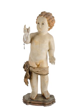 SCULTURA in terracotta raffigurante "Bambinello", base in legno (filature)....