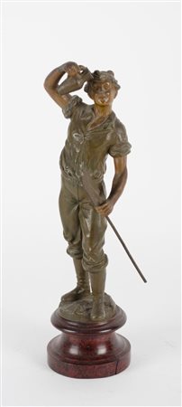 SCULTURA in antimonio raffigurante "ragazzo", base in legno dorato (usure)....