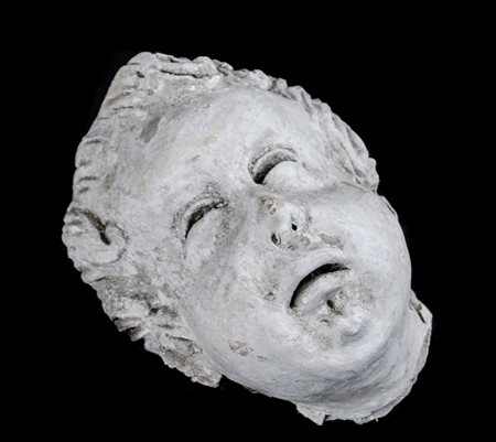 SCULTURA in stucco raffigurante "testa di putto". Sicilia XIX secolo Misure:...