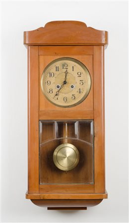 OROLOGIO da parete in noce con quadrante in metallo. Anni '40 Misure: cm 34 x...