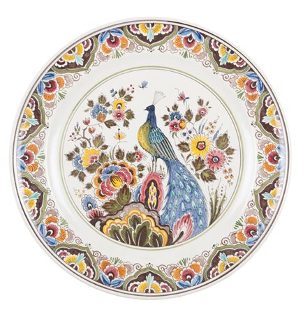 PIATTO in ceramica bianca decorata raffigurante "pavone". XX secolo Misure:...