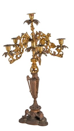 CANDELABRO in bronzo dorato a sei fiamme. Sicilia XIX secolo Misure: h cm 56