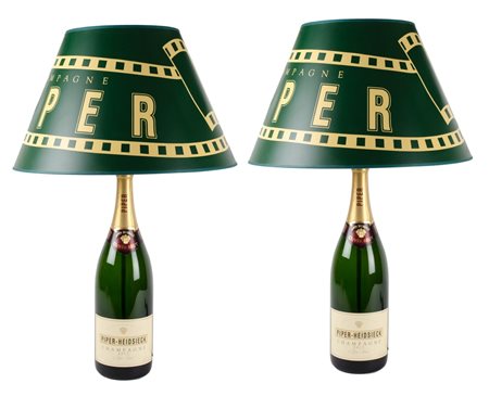 COPPIA LUMI realizzati con bottiglie di Chamagne. XX secolo Misure: h cm 78