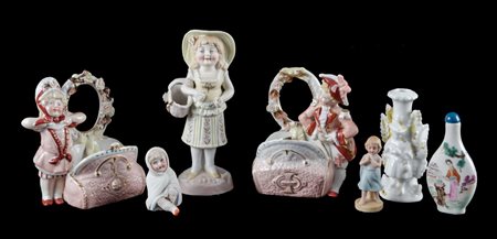 LOTTO composto da sei SCULTURINE e da piccola BOTTIGLIETTA in porcellana....