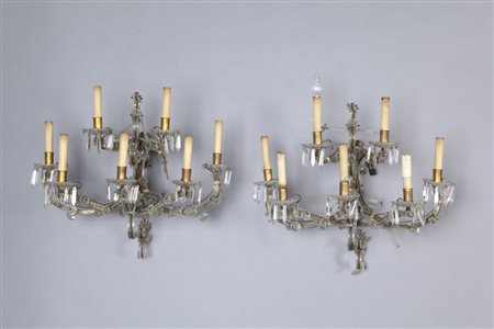 Tre grandi apliques a sette luci in ferro e cristalli cm 60x h. 55