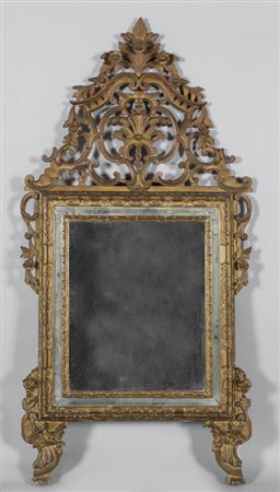 Specchiera Luigi XIV in legno finemente intagliato e dorato con...
