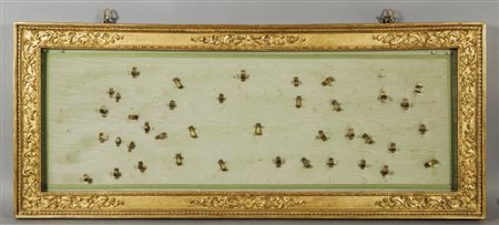 Paliotto in legno intagliato e dorato adattato ad espositore, inizi sec....