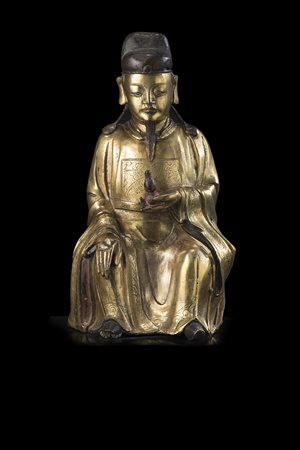 Scultura in bronzo dorato raffigurante dignitario con copricapo, con piccolo...