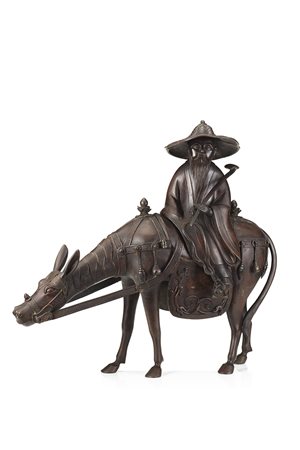 Saggio dalla lunga barba a dorso di asino con sella decorata, indossa un...