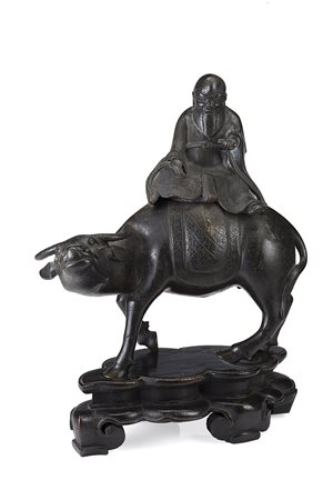 Bruciaincenso in bronzo raffigurante un saggio dalla lunga barba a dorso di...