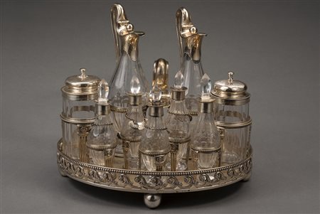 Cruet in argento con base sagomata, bordo traforato con motivo ad onde,...