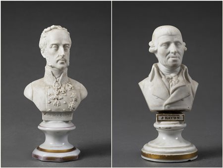 Due busti in porcellana raffiguranti J. Haydn e Gratz, su basi a plinto...