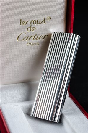 ACCENDINO Cartier in metallo argentato. XX secolo Misure: cm 7