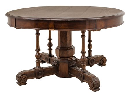 TAVOLO da pranzo ovale in noce con piede centrale. Sicilia XIX secolo Misure:...