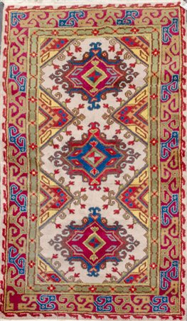 TAPPETO guida Samarkanda, trama e ordito in cotone e vello in lana. XX secolo...