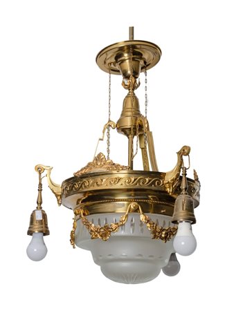 LAMPADARIO in ottone dorato a quattro luci con boccia in vetro (mancanze)....