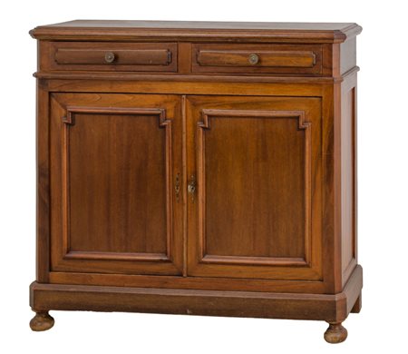 CREDENZINA a due ante in noce con due cassetti. Italia fine XIX secolo...