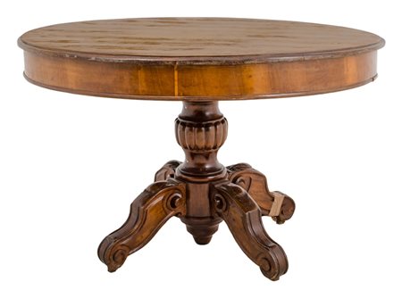 TAVOLO tondo in noce con fusto a colonna e quattro piedi. XIX secolo Misure:...