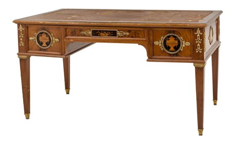 SCRIVANIA stile Impero in mogano e piuma di mogano con guarniture in bronzo....