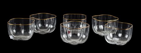 SEI COPPETTE in vetro di Murano con perfilo in oro. XX secolo Misure: cm 10 x...