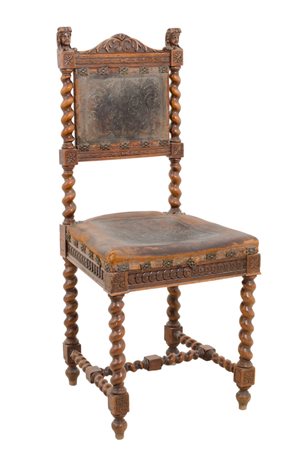 SEDIA coloniale in legno e cuoio (seduta h cm 50). XIX secolo Misure: cm 44 x...