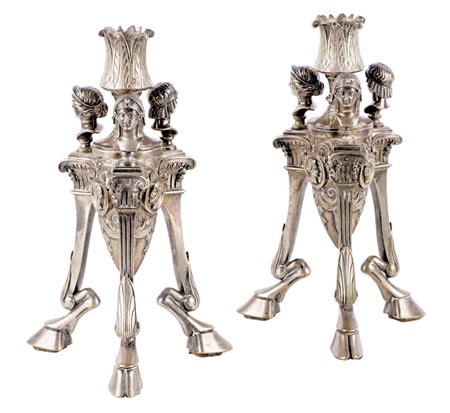 Coppia di candelieri in bronzo argentato stile Impero Altezza cm 23