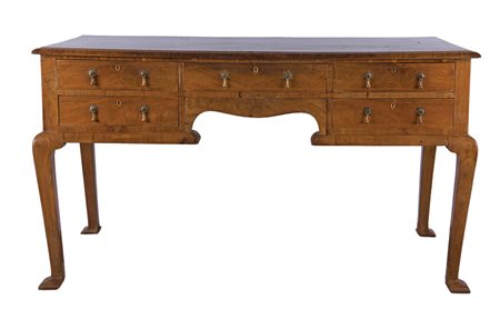 Scrivania in legno di noce, Inghilterra fine del XIX Cinque cassetti ed alte...
