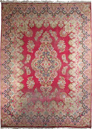 Tappeto Persiano Kirman Fondo rosso con decori nei toni del beige e del blu....