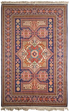 Tappeto Persiano Fondo blu con decori geometrici nei toni del rosso e del...