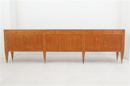 UNA CREDENZA, anni '50Legno di teak, legno impiallacciato in teak, ottone,...