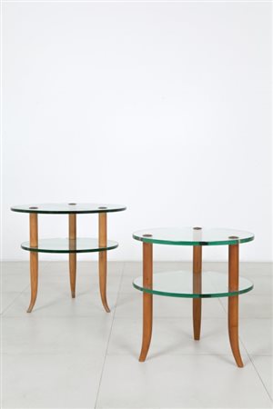 DUE TAVOLINI, anni '50. Legno di frassino tornito, cristallo molato. Altezza...