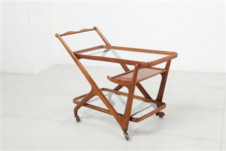CASSINA (Editore)Un carrello, anni '50. Legno di faggio, cristallo. Cm 72 (h)...