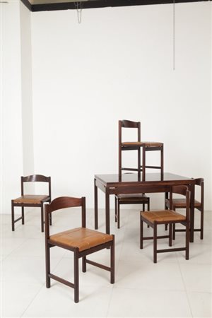 POLTRONOVA (Editore)Un tavolo estensibile a libro e sei sedie "Toscanella",...