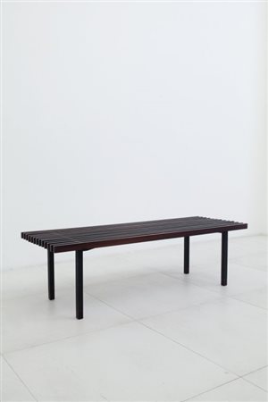 UNA PANCA, anni '60. Tubo quadro di ferro verniciato, legno di palissandro....