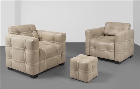 SALVATORE FERRAGAMODue poltrone e un poggiapiedi, anni '70. Struttura in...